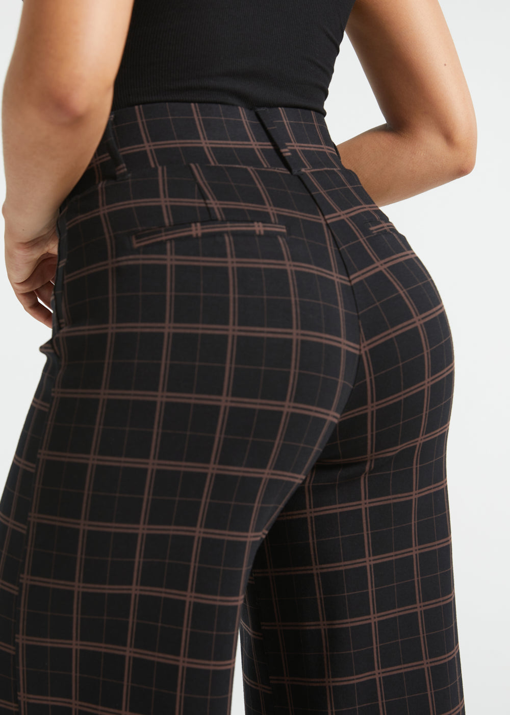 Close-up back view of Black Brown Plaid Dress Pant Yoga Pants showing the waistband, belt loops and faux welt pockets