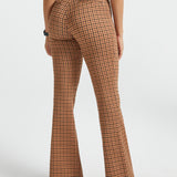 Back three-quarter view of woman wearing Camel Mini Houndstooth straight-leg Dress Pant Yoga Pants with brown heels
