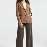 Full-length woman wearing Camel Mini Houndstooth Classic Blazer with brown wide-leg pants and white top