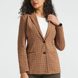 Woman wearing Camel Mini Houndstooth Classic Blazer buttoned over a white top, front three-quarter view
