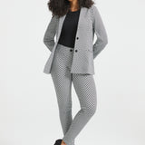 Full-length woman wearing the Black Ivory Catstooth Classic Blazer with matching slim pants and black heels