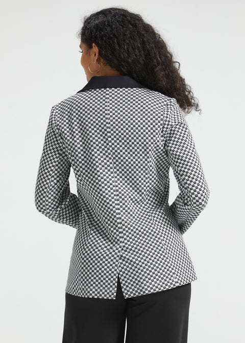Back view of woman wearing the Black Ivory Catstooth Classic Blazer showing the contrast black collar and center back vent