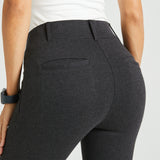 Close up back view charcoal gray pants on model showing back pockets and belt loop features
