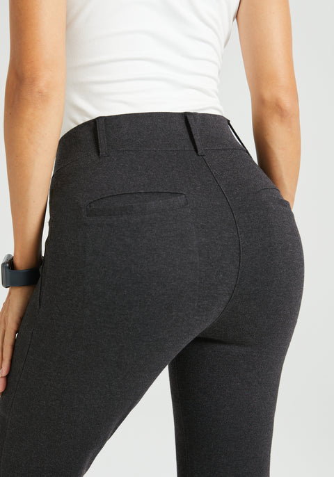 Close up back view charcoal gray pants on model showing back pockets and belt loop features
